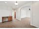 The living room offers an arched entryway and a built-in wet bar area at 1890 Bel Lago Vw, Monument, CO 80132