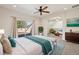 Relaxing main bedroom suite with private terrace, ceiling fan, and stylish decor at 1890 Bel Lago Vw, Monument, CO 80132