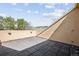 Private patio provides a peaceful outdoor space, with views of lush trees and surrounding greenery at 1890 Bel Lago Vw, Monument, CO 80132