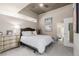 Comfortable bedroom with soft carpet, elegant furnishings, and ample natural light at 1700 Bassett St # 513, Denver, CO 80202