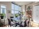 Bright dining area with floor-to-ceiling windows and stylish lighting fixtures at 1700 Bassett St # 513, Denver, CO 80202