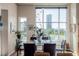 Dining area featuring large windows offering city views at 1700 Bassett St # 513, Denver, CO 80202