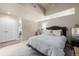 Comfortable bedroom featuring carpet, large bed, and closet at 1700 Bassett St # 513, Denver, CO 80202