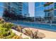 Swimming pool with lounge chairs overlooking modern buildings, perfect for relaxation and recreation at 1700 Bassett St # 513, Denver, CO 80202
