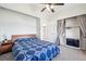 Bright bedroom features a large closet and en suite bathroom at 2208 S Eldridge Ct, Lakewood, CO 80228
