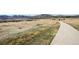 A neighborhood walking path offers a space to stay active and enjoy the beautiful mountain scenery at 2208 S Eldridge Ct, Lakewood, CO 80228