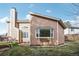 Exterior view of a well-maintained home with a modern style and manicured lawn, creating a pleasing curb appeal at 2208 S Eldridge Ct, Lakewood, CO 80228