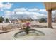A view of the front yard, landscaping, and a decorative water feature from the front porch at 2208 S Eldridge Ct, Lakewood, CO 80228