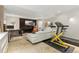 Finished basement with a home gym and comfortable seating area at 2253 Imperial Ln, Superior, CO 80027