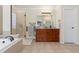 Spa-like bathroom with a large soaking tub and walk-in shower at 2253 Imperial Ln, Superior, CO 80027