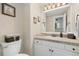 Convenient half bathroom with a single vanity and granite countertop at 2253 Imperial Ln, Superior, CO 80027