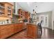 Modern kitchen with island, stainless steel appliances, and wood cabinets at 2253 Imperial Ln, Superior, CO 80027