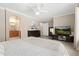 Main bedroom with ensuite bathroom and large TV at 2253 Imperial Ln, Superior, CO 80027