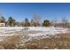 Snowy park with picnic table and open space at 2253 Imperial Ln, Superior, CO 80027