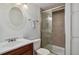 Cozy bathroom featuring a vanity, toilet, and shower at 10291 Carrara Ter, Parker, CO 80134