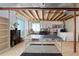 Unfinished basement area featuring exposed ceiling beams and versatile space for recreation or storage at 8196 Wetherill Cir, Castle Pines, CO 80108