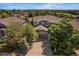 Inviting two-story home with a well-maintained lawn and mature trees at 8196 Wetherill Cir, Castle Pines, CO 80108