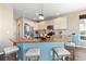 A well-equipped kitchen with modern appliances, custom cabinetry, and a central island, providing ample workspace and style at 8196 Wetherill Cir, Castle Pines, CO 80108