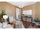 Stylish living room featuring hardwood floors, comfortable seating, and modern decor at 8196 Wetherill Cir, Castle Pines, CO 80108