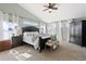 Serene main bedroom with vaulted ceilings, soft natural light, and elegant furnishings and decor at 8196 Wetherill Cir, Castle Pines, CO 80108