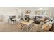 Well-lit living space featuring comfortable seating, playful decor, and a stylish rope-accented coffee table at 3514 Belleville Ridge Rd, Elizabeth, CO 80107