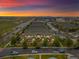 Stunning aerial view of townhomes complex, displaying a community with well-maintained landscaping and serene surroundings at 5800 Tower Rd # 610, Denver, CO 80249