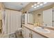 Well-maintained bathroom with a shower-tub combo, vanity, and ample storage space at 5800 Tower Rd # 610, Denver, CO 80249