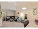 Inviting living room with high ceilings, ample natural light, and comfortable seating area at 5800 Tower Rd # 610, Denver, CO 80249