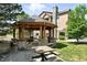 Community gazebo featuring seating and stone supports at 8489 Canyon Rim Cir # 302, Englewood, CO 80112