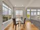 Bright dining area with large windows and access to the living room at 5781 S Union Ter, Littleton, CO 80127