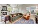 Comfortable living room with fireplace, hardwood floors, bright light and vaulted ceilings at 16839 Trail View Cir, Parker, CO 80134