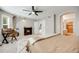 Spacious bedroom with a fireplace, desk and easy access to the bathroom at 16839 Trail View Cir, Parker, CO 80134