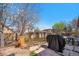 A lovely backyard with a grill, patio furniture, landscaping and privacy fencing to enjoy outdoor living at 20137 E Prentice Pl, Centennial, CO 80015