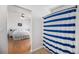 Bright bathroom with shower/tub combo. Bedroom in background at 20137 E Prentice Pl, Centennial, CO 80015