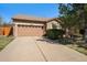 Charming single-story home featuring an attached two-car garage and well-maintained landscaping at 20137 E Prentice Pl, Centennial, CO 80015