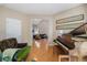 Elegant living room featuring hardwood floors and an open doorway at 20137 E Prentice Pl, Centennial, CO 80015