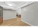 Finished basement with hardwood flooring, bright lighting and neutral walls at 4720 W 39Th Ave, Denver, CO 80212