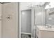 Basement bathroom featuring a shower with new fixtures and a stylish vanity at 4720 W 39Th Ave, Denver, CO 80212