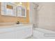 Clean bathroom with a bathtub, shower, and updated vanity at 12780 E Bethany Pl, Aurora, CO 80014