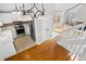 Kitchen with stainless steel appliances and white cabinets at 12780 E Bethany Pl, Aurora, CO 80014