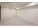 Unfinished basement area has new carpeting and recessed lighting at 4972 Easley Rd, Golden, CO 80403