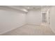 Unfinished basement space features neutral carpet and bright recessed lighting at 4972 Easley Rd, Golden, CO 80403