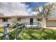 Lovely home showcasing a quaint front porch, well-maintained lawn and fence for added curb appeal at 4972 Easley Rd, Golden, CO 80403