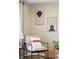 Comfortable living room featuring modern art and a cozy armchair at 4972 Easley Rd, Golden, CO 80403