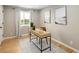 Office space featuring hardwood floors, a light desk and modern decor at 4972 Easley Rd, Golden, CO 80403