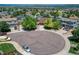 Aerial view of homes on a cul-de-sac showing well-maintained lawns and mature trees at 4385 Oakes Mill Ct, Castle Rock, CO 80109