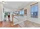 Bright foyer with hardwood floors, a staircase, and abundant natural light at 4385 Oakes Mill Ct, Castle Rock, CO 80109