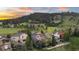 Scenic back exterior with multiple decks and mountain views, perfect for outdoor living and entertaining at 24005 High Meadow Dr, Golden, CO 80401