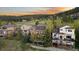 Spacious backyard featuring a multi-tiered deck, perfect for outdoor living and entertaining at 24005 High Meadow Dr, Golden, CO 80401