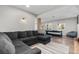 Basement featuring sleek, hardwood floors, a pool table, bean bag and an oversized sectional at 24005 High Meadow Dr, Golden, CO 80401
